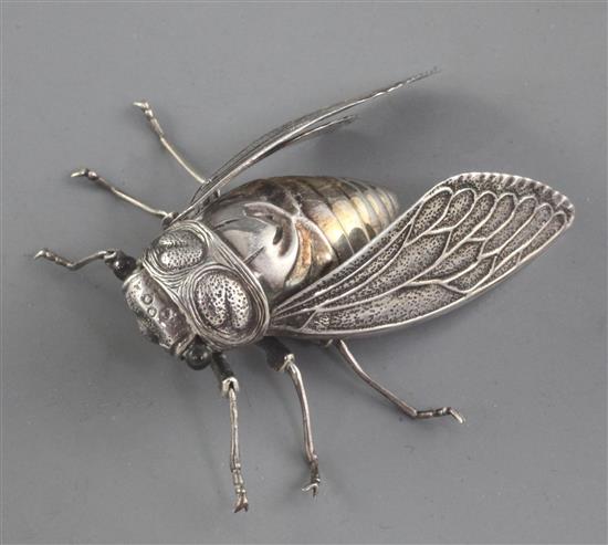 A Japanese silver articulated model of a cicada, by Muneyoshi, Meiji period, length 5.2cm